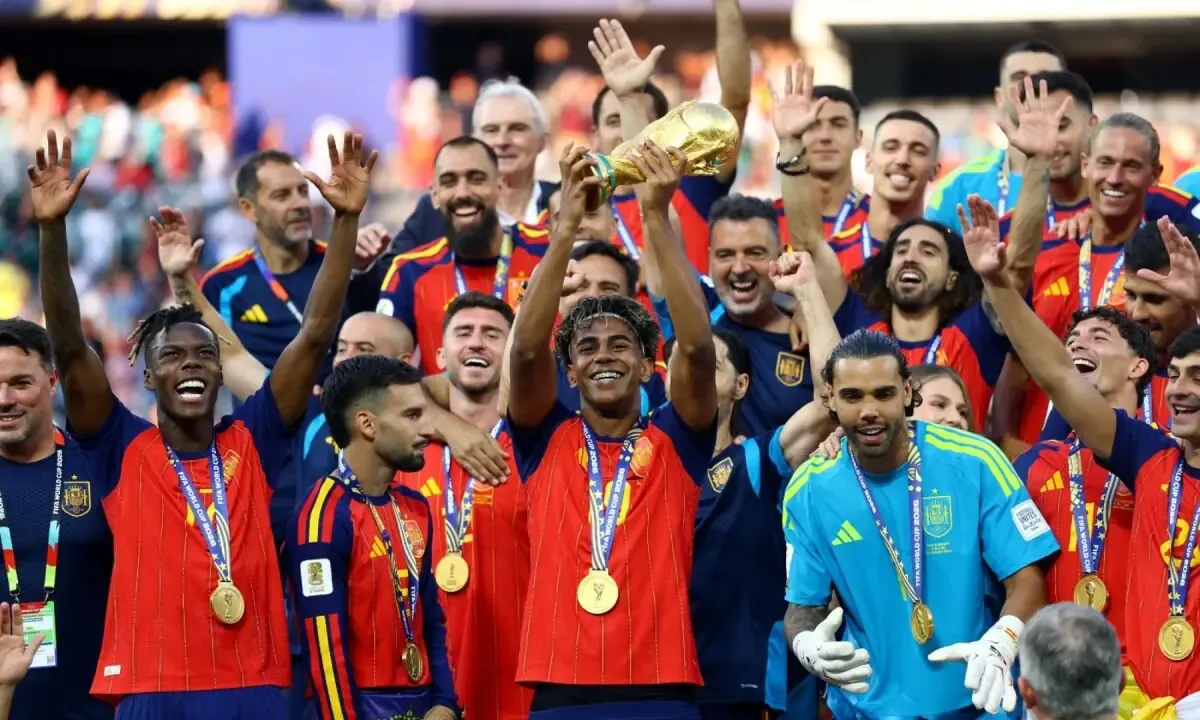 Spain’s Lamine Yamal lifts the FIFA World Cup trophy as the team celebrates their victory at the New York/New Jersey Stadium, East Rutherford, New Jersey, the US on July 19, 2026.
